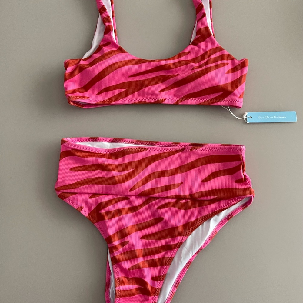 • High Waisted Bikini
• Pink and muted red
• Animal print